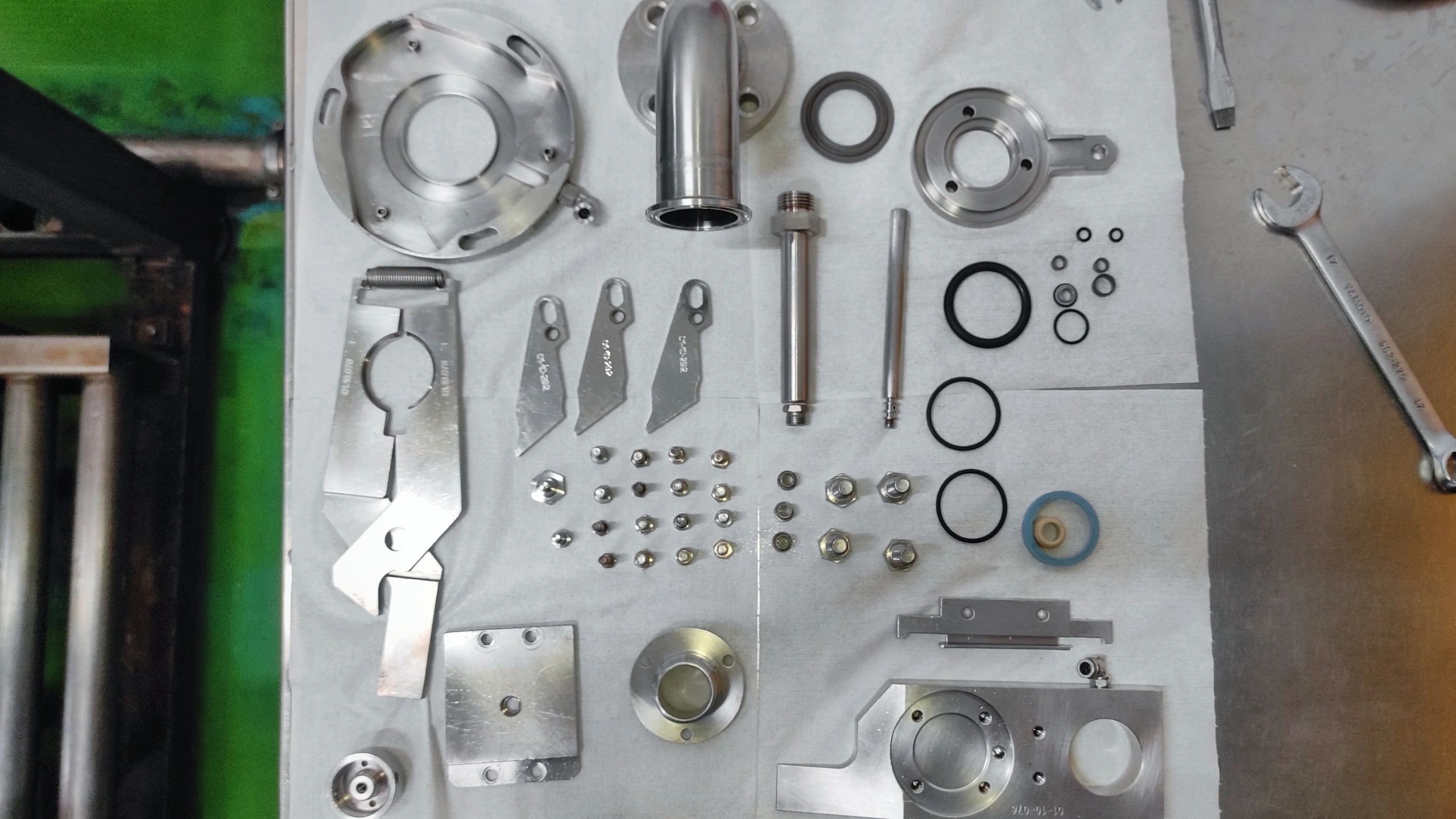 Machine part arranged after using for production in production room of factory