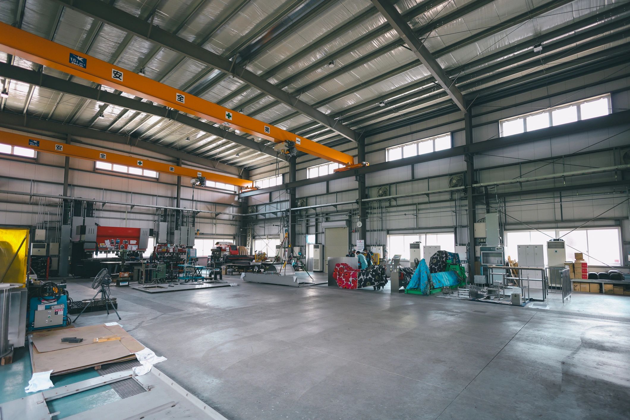 Industrial factory interior supporting metal component production