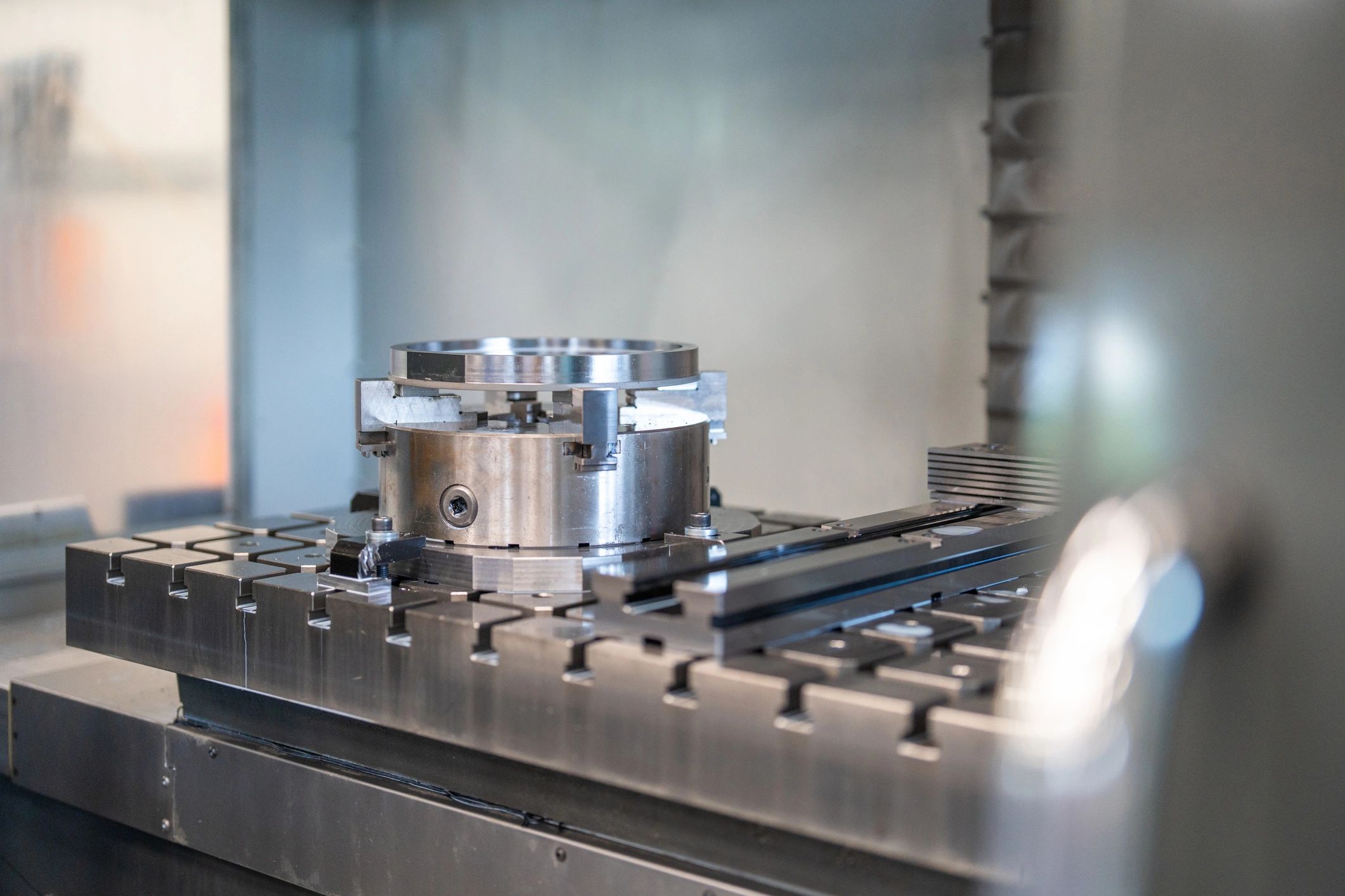 CNC machined component on precision milling table
