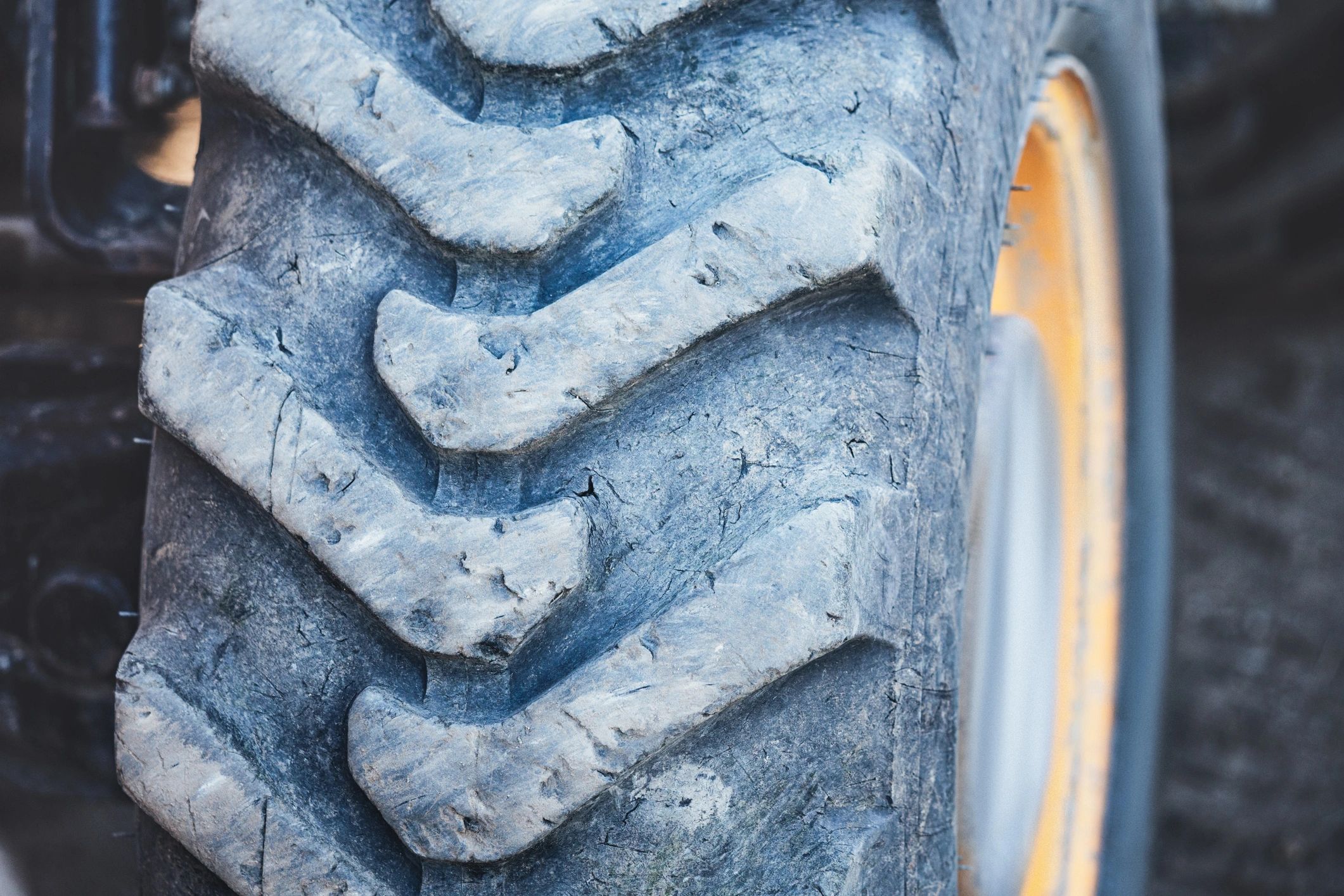 Heavy-duty tractor tire detail representing agricultural rubber component applications