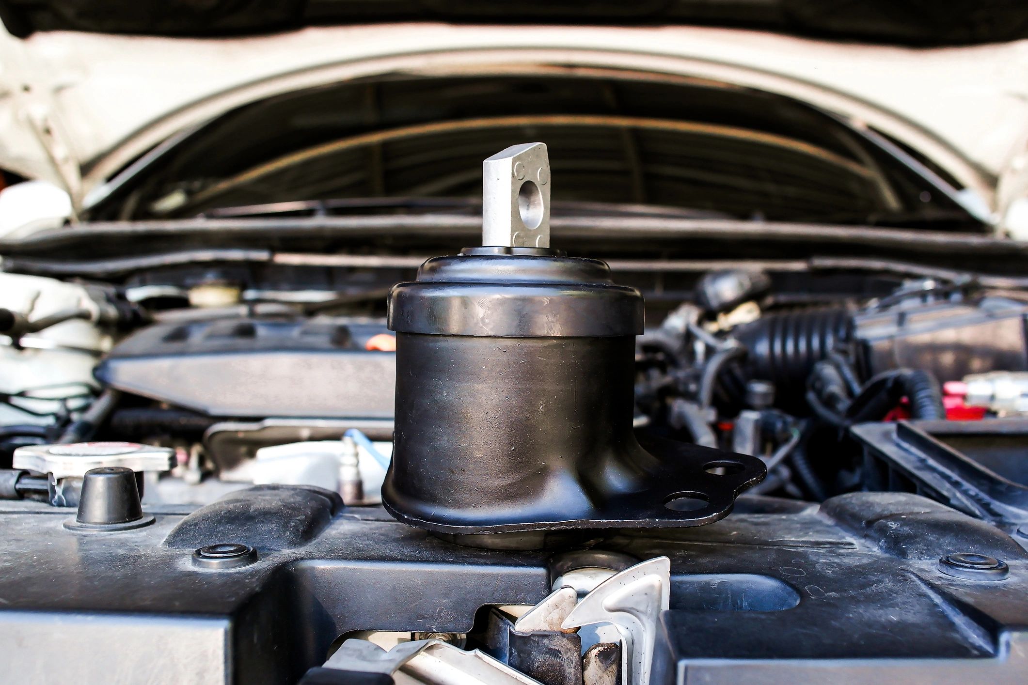 Aftermarket rubber-metal engine mount ready for replacement part supply